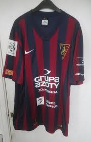 Their last meeting was a draw. Pogon Szczecin Home Football Shirt 2015 2016