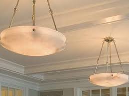 Ornate large torch navarra alabaster bowl sconce from brass light gallery is crafted with real alabaster stone. High Quality Hand Carved Alabaster Lighting