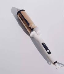 When was the first official curling iron made? 2 Soft Bend Curling Iron Kristin Ess Hair
