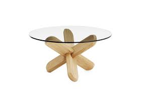 They were called cocktail tables. Ding Table A Scuptural Coffee Table In Transparent Glass And Oak