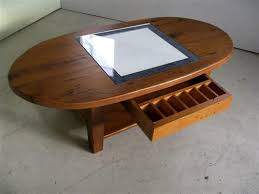 The best way to tie your room together is with a stylish coffee table. Rustic Oval Coffee Table With Drawers Ecustomfinishes