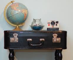 Take the chill off a compact nook with a homely leather. 10 Genius Diys How To Decorate With Vintage Suitcases Organic Authority
