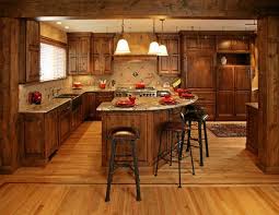 Knotty Alder Cabinets Knotty Alder Dark Stained Cabinets With A Large Center Island Love Alder Cabi Lake House Kitchen Rustic Kitchen Design Alder Cabinets