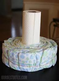 The cake in this tutorial uses 48 diapers, but since diaper brands vary in size, it's good to have a few extra on hand. How To Make A Diaper Cake Centerpiece Our Best Bites