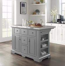 Forecast Gray Islands Are Taking Over White Kitchens And We Predict Sunny Feelings For Everyone Hunker Grey Kitchen Island Small Kitchen Island Kitchen Island Decor