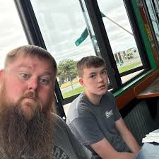 Who can provide a haircut for an autistic child in Saginaw?