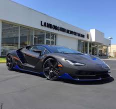 Black And Blue Lamborghini Centenario Lamborghini Centenario Coupe Made Out Of Exposed Carbon Fiber And Blu Nethuns Accents Photo Taken By Lambonew Lamborghini Cars Lamborghini Veneno Sports Car