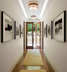 Picture Perfect Decorate With Black And White Photographs For Exquisite Interiors Narrow Hallway Decorating Hallway Decorating Hallway Design