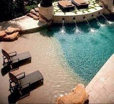 29 Amazing Backyards That Will Blow Your Kids Minds Beach Entry Pool Pool Outdoor