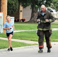 Moses, Lewis top field in 5 Alarm 5K