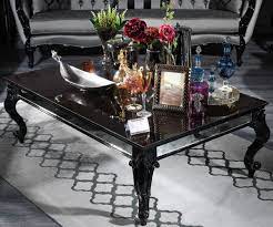Complement any room in the home with stylish furniture, no matter the theme. Casa Padrino Luxury Baroque Coffee Table Black Brown 140 X 90 X H 46 Cm Elegant Solid Wood Living Room Table With Glass Top And Mirror Glass Luxury Quality Made In Italy