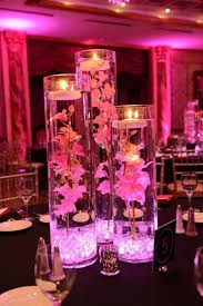 All you need is some glass containers, orbeez. Pink Orchid Centerpiece Pink Vases With Crystals Lights Orchids Floating Candles Pink Orchids Centerpiece Flower Centerpieces Wedding Wedding Centerpieces
