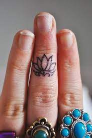 Om Lotus Tattoo For More Exciting Tattoos Visit Www Tattooenigma Com Lotus Tattoo Design Finger Tattoos Tiny Finger Tattoos