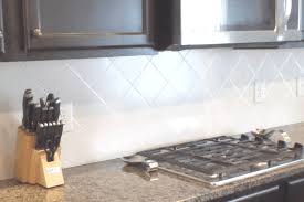 Tile over tile if the ceramic tiles are well bonded to the wall, it is possible to install new tiles right on top of the old ones. Painting Tiled Kitchen Backsplash A Complete How To Guide