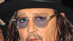 Heard går vidare från deppiga rättsbråket: ”amber lever sitt bästa liv!”