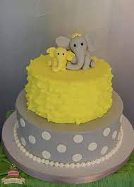 Child And Mother Elephant Made From Yellow And Grey Fondant Topping A Grey And Yellow Baby Shower Cakes For Boys Baby Shower Cakes Elephant Baby Shower Cake