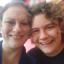 Husky trying to mother cats?