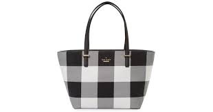 You can find a kate spade purse for various occasions at different price points. Kate Spade Cotton Cedar Street Plaid Tote Bag In Black Lyst