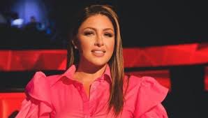 Tα μουσικά είδη της είναι το σύγχρονο λαϊκό, ποπ και χορευτικό. Elena Paparizoy Star Gr