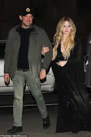 So, how much is avril lavigne worth at the age of 36 years old? Avril Lavigne Dons Low Cut Jumpsuit While Arm In Arm With Billionaire Beau Phillip Sarofim In Nyc Daily Mail Online