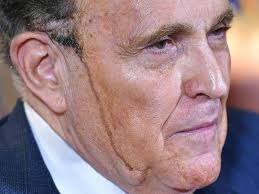 Because he appears to have hair dye streaming down his face. Donald Trump Lawyer Rudy Giuliani S Hair Dye Runs Down His Face During Press Conference The Advertiser