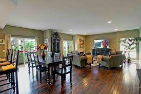 White desk in living room with wicker baskets. Paint Ideas For Open Living Room And Kitchen Living Room Floor Plans Open Concept Living Room Open Living Room