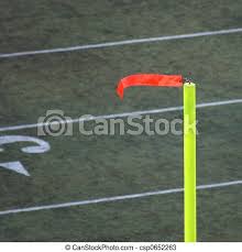 These slingshot design football field goal posts meet ncaa specifications and have a secure base plate mounting design system that ensures simple and secure installation. Goal Post On Field Goal Post On Football Field With Blaze Orange Marker Blowing In The Wind Canstock