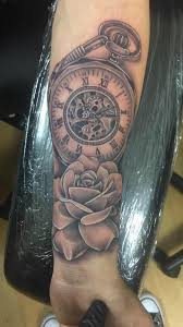 Rose tattoos for guys can encompass traditional red designs or small, simple ideas. Fun Rose And Clock Tattoo I Did Today Tattoo