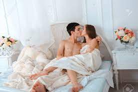 Categories in which bedroom kissing is included Beautiful Young Couple Without Clothes In White Bed Kissing Stock Photo Picture And Royalty Free Image Image 61594423