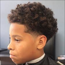 For example, a short curly haircut with lifting up strands at the top of the head, which give the hair a kind of negligence, is great for a young black boy. Pin On Maxwell