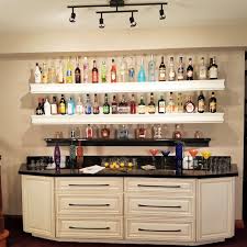 A basement remodel can add significant value to your home. Basement Bar Ideas Liquor Bottle Storage Renee Romeo