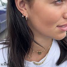 "Wilma" small gold plated pearl earrings with peach colored pearls