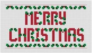 Model stitched on 28 ct. Christmas Holly Alphabet 17