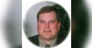 John Nikolas Kelly Obituary