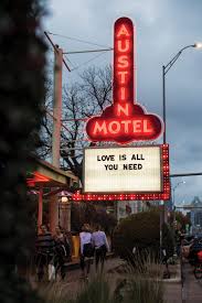 A photograph of an old neon movie house marquee in the daytime. The History Behind Austin S Most Iconic Neon Signs Austin Monthly Magazine