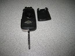 There is a push button lock/unlock button in the center . 2014 Chevy Key Fob Battery Replacement Cheap Online Shopping