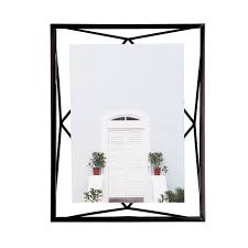 Resting comfortably between two sturdy panes of glass, the frame creates a floating effect and adds a degree of dimension and depth. Prisma Geometric Picture Frame Shop Modern Picture Frames Umbra