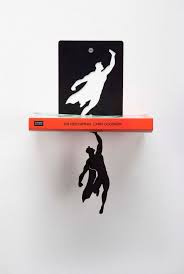 metal hanging book shelf floating bookshelf superhero etsy in 2021 silhouette bookshelves handmade shoe rack