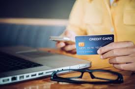 Online payments of your walmart credit card are subject to the gemb (general electric money bank) policy. Premium Photo Businessman Holding Credit Card And Working On Laptop For Online Banking