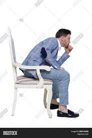 Premium stock photo of man sitting in a chair. Man Suit Sitting On Image Photo Free Trial Bigstock