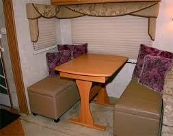 Dining Area Inside A Fifth Wheel With An Ottoman Added For Seating Dinette Rv Living Rv Storage