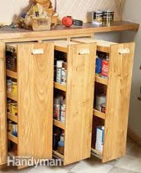 We removed the wall between our living room and kitchen to make more of a bought the door to the pull out from the restore for $15.00. Kitchen Storage Pull Out Pantry Shelves Diy Family Handyman