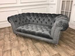Tori spelling orange tufted chesterfield sofa, moroccan tray coffee table, black fireplace, mirror and drapes. Black Velvet Chub Chesterfield Sofa Aged To Perfection Upholstery