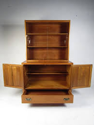 Hickory storage cabinets, with description: Midcentury Walnut China Cabinet By Hickory Manufacturing For Sale At 1stdibs