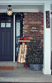 Front Porch Decorated For Christmas Love The Black Front Door Front Porch Christmas Decor Exterior Christmas Lights Christmas Porch Decor