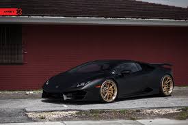 Black And Gold Lamborghini Huracan Matte Black Lamborghini Huracan On Contrasting Gold Rims Lamborghini Huracan Lamborghini Matte Black