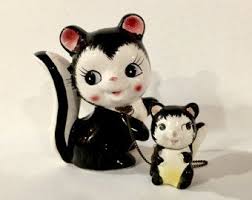 143,078 two black guys free videos found on xvideos for this search. Vintage Mother And Baby Ceramic Skunk Figurines With Original Chain Hand Painted Set Of Two Made In Japan Mid Century Figuri Hand Painted Vintage Kitschy