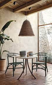 Make a long dining table feel fresh with dining benches on either side. Bistro Indoor Dining Table Expormim