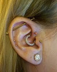 What do you need to know about daith piercing? Industrial Daith Forward Helix Tragus Double Helix Piercings Helix Piercing Double Helix Piercings Ear Piercings