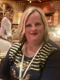 Here are a couple of pictures of my daughter Amy M Loree who has Down's  syndrome. She turns 51 today and these photos are all from the past five  years. When she